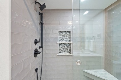 Elegantly remodeled in the last two years, this 3-level, 2,096SF