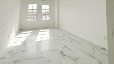 Unique & modern 3-bedroom, 2-bath corner unit at Alaqua