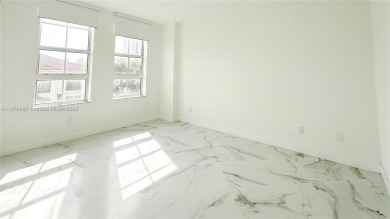 Unique & modern 3-bedroom, 2-bath corner unit at Alaqua