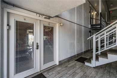 Fully furnished first floor corner condo that offers a compact