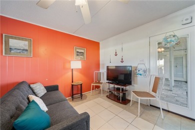 Fully furnished first floor corner condo that offers a compact