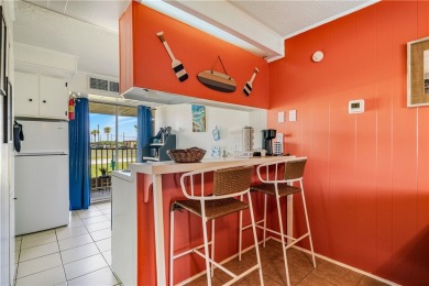 Fully furnished first floor corner condo that offers a compact