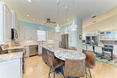 Luxury Waterfront Living at Its Finest - Top-Floor Tarpon Cove