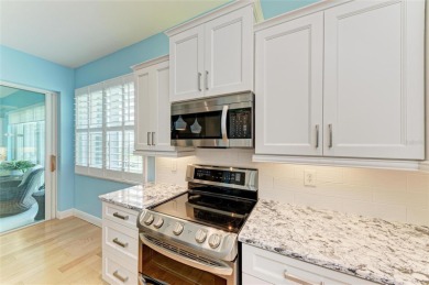 Luxury Waterfront Living at Its Finest - Top-Floor Tarpon Cove