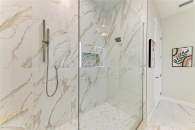 Luxury Waterfront Living at Its Finest - Top-Floor Tarpon Cove