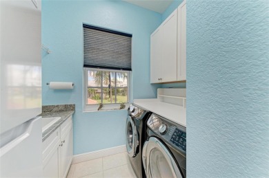 Luxury Waterfront Living at Its Finest - Top-Floor Tarpon Cove