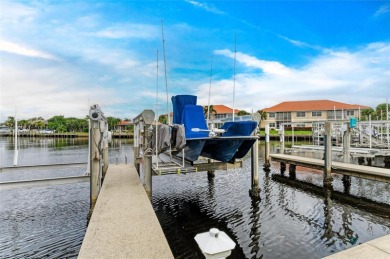 Luxury Waterfront Living at Its Finest - Top-Floor Tarpon Cove