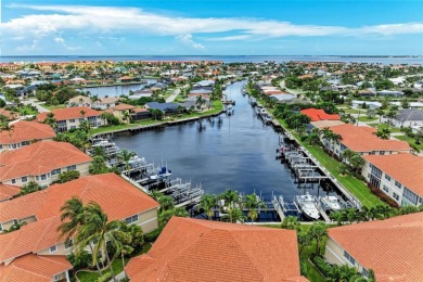 Luxury Waterfront Living at Its Finest - Top-Floor Tarpon Cove