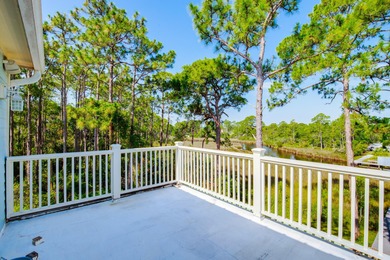Welcome to your waterfront sanctuary at 95 Bluebell Cir, Santa