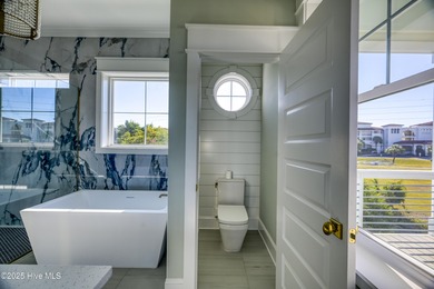 Custom-built 4BR/3.5BA coastal home in a sought-after North