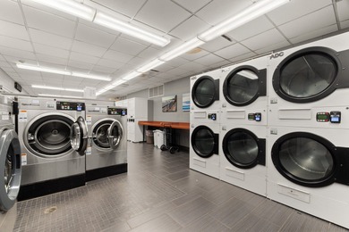 Lakefront Living with Sweeping Views! Enjoy stunning