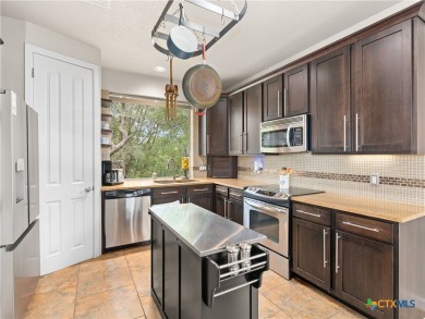 Experience lake living at its finest in this beautifully updated