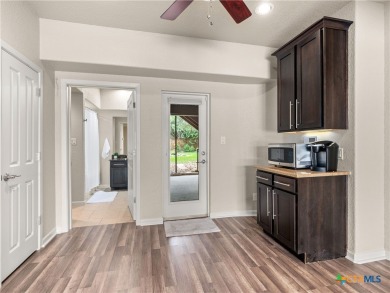 Experience lake living at its finest in this beautifully updated