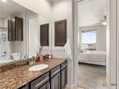 Experience lake living at its finest in this beautifully updated