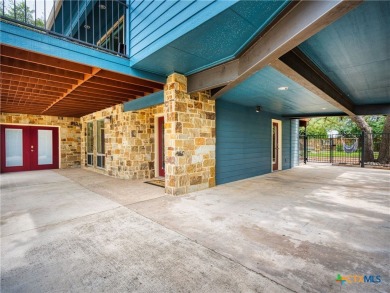 Experience lake living at its finest in this beautifully updated