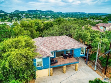 Experience lake living at its finest in this beautifully updated