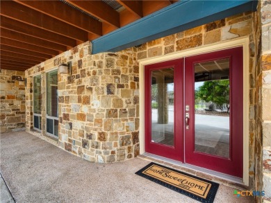 Experience lake living at its finest in this beautifully updated