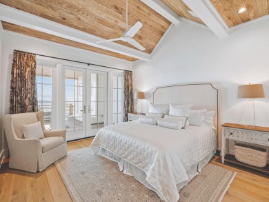 This stunning Camp Creek Lake residence offers private