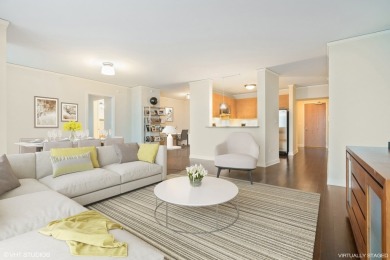 This is a large one bedroom plus den home on the 62nd floor of