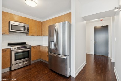 This is a large one bedroom plus den home on the 62nd floor of