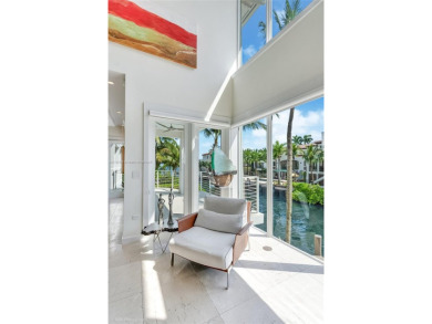 A private tropical oasis--waterfront estate with 150 FT of water