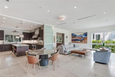 A private tropical oasis--waterfront estate with 150 FT of water