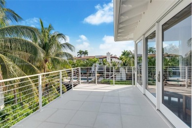 A private tropical oasis--waterfront estate with 150 FT of water