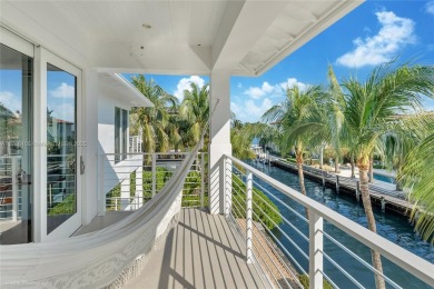 A private tropical oasis--waterfront estate with 150 FT of water