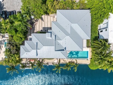 A private tropical oasis--waterfront estate with 150 FT of water