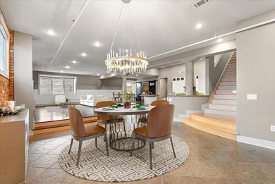 Welcome to Penthouse 401 at 230 N Kalamazoo Mall - where modern