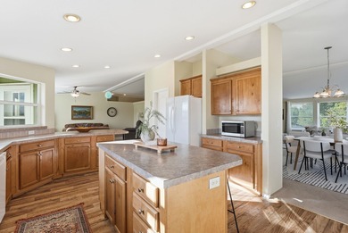 Tucked on nearly five acres in Chattaroy, this 2,800 sq ft home