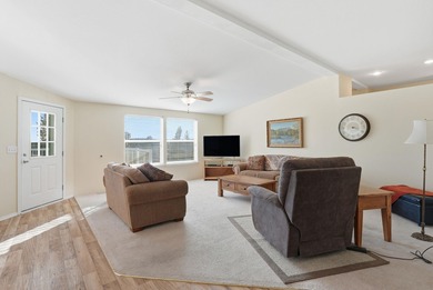 Tucked on nearly five acres in Chattaroy, this 2,800 sq ft home