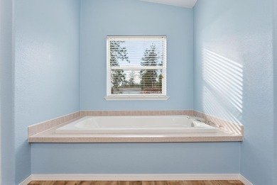 Tucked on nearly five acres in Chattaroy, this 2,800 sq ft home