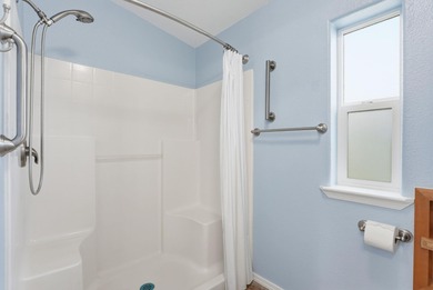 Tucked on nearly five acres in Chattaroy, this 2,800 sq ft home