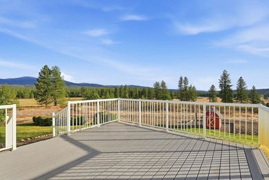 Tucked on nearly five acres in Chattaroy, this 2,800 sq ft home