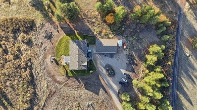 Tucked on nearly five acres in Chattaroy, this 2,800 sq ft home