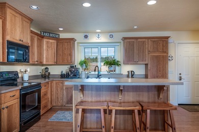 Welcome to 2036 Marina Court, a beautifully maintained residence