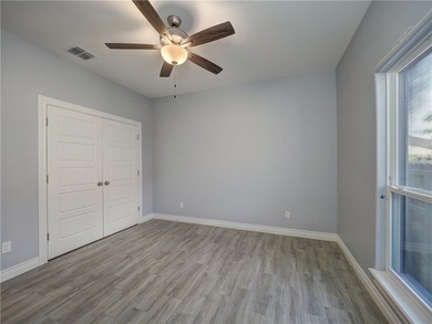 Your Island Oasis awaits you with this exceptional property that