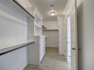 Your Island Oasis awaits you with this exceptional property that