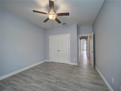 Your Island Oasis awaits you with this exceptional property that