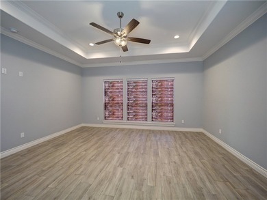 Your Island Oasis awaits you with this exceptional property that