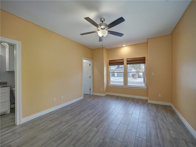 Your Island Oasis awaits you with this exceptional property that