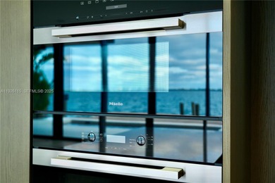 A commanding trophy estate on the open bay within the ultra