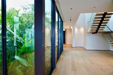 A commanding trophy estate on the open bay within the ultra