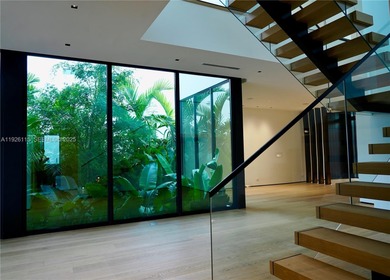 A commanding trophy estate on the open bay within the ultra