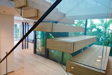 A commanding trophy estate on the open bay within the ultra