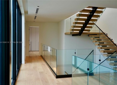 A commanding trophy estate on the open bay within the ultra