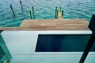 A commanding trophy estate on the open bay within the ultra