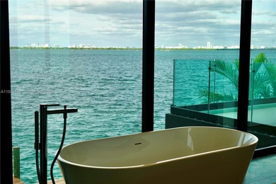 A commanding trophy estate on the open bay within the ultra