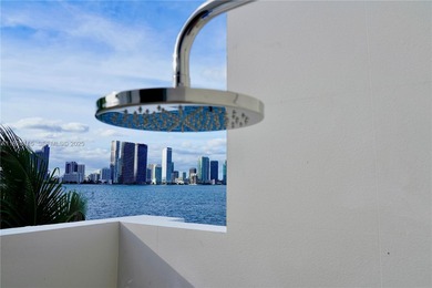 A commanding trophy estate on the open bay within the ultra